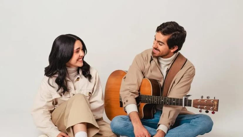 photo of artists sitting on the floor